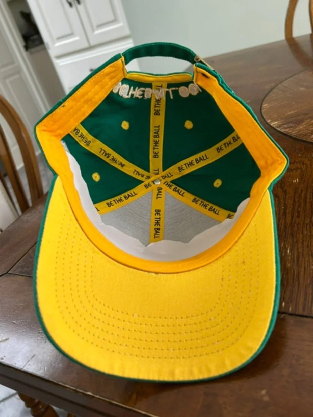 BE THE BALL Golf Cap with adjustable strap - $19